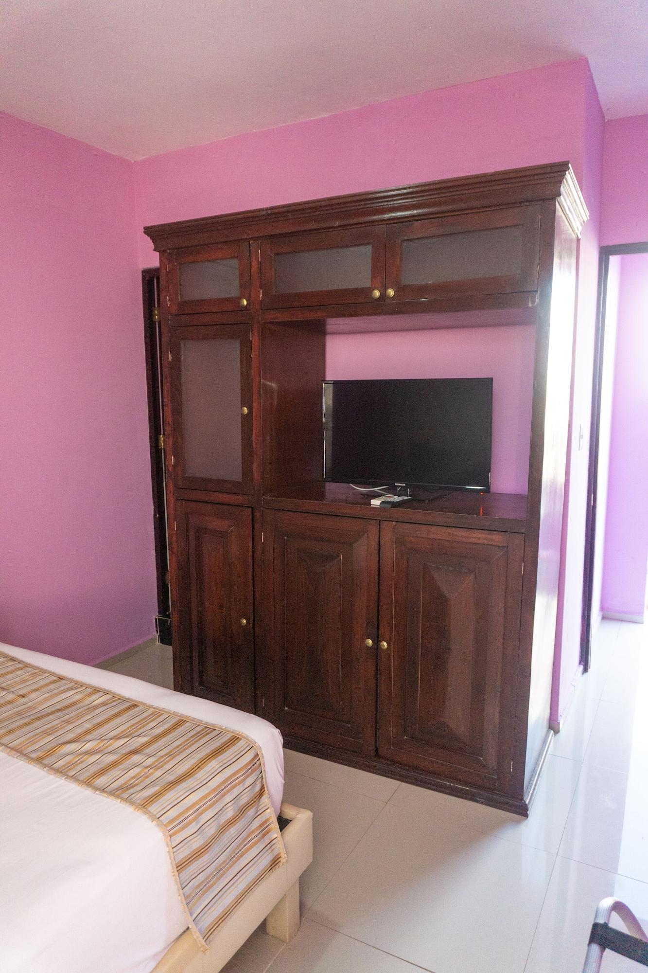 Hotel Lavanda Cas Merida Mérida Exterior foto A television set in a bedroom