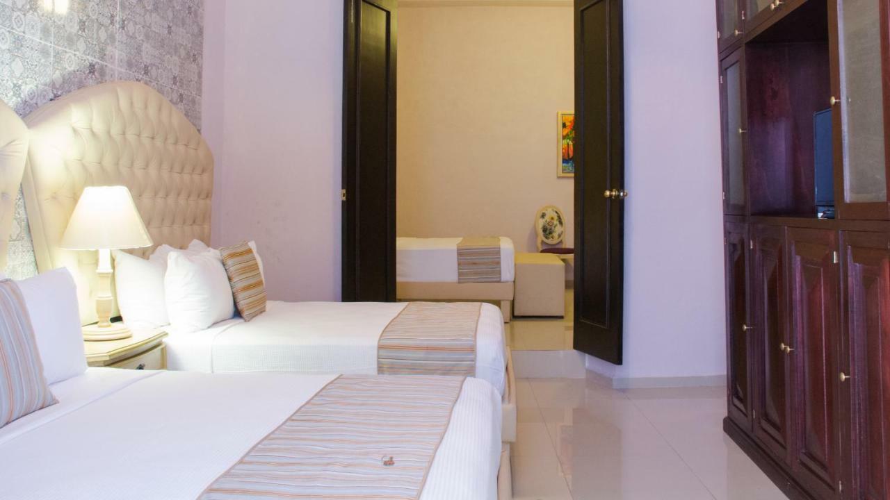 Hotel Lavanda Cas Merida Mérida Exterior foto A bedroom at the hotel